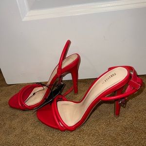 Brand new red heels